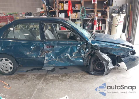 1999 Toyota Corolla Le z USA, uszkodzony, nr VIN 1NXBR18EXXZ169977